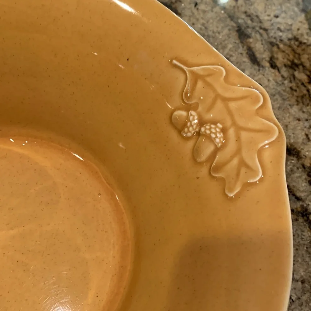 Crate & Barrel large bowl. Golden yellow.
